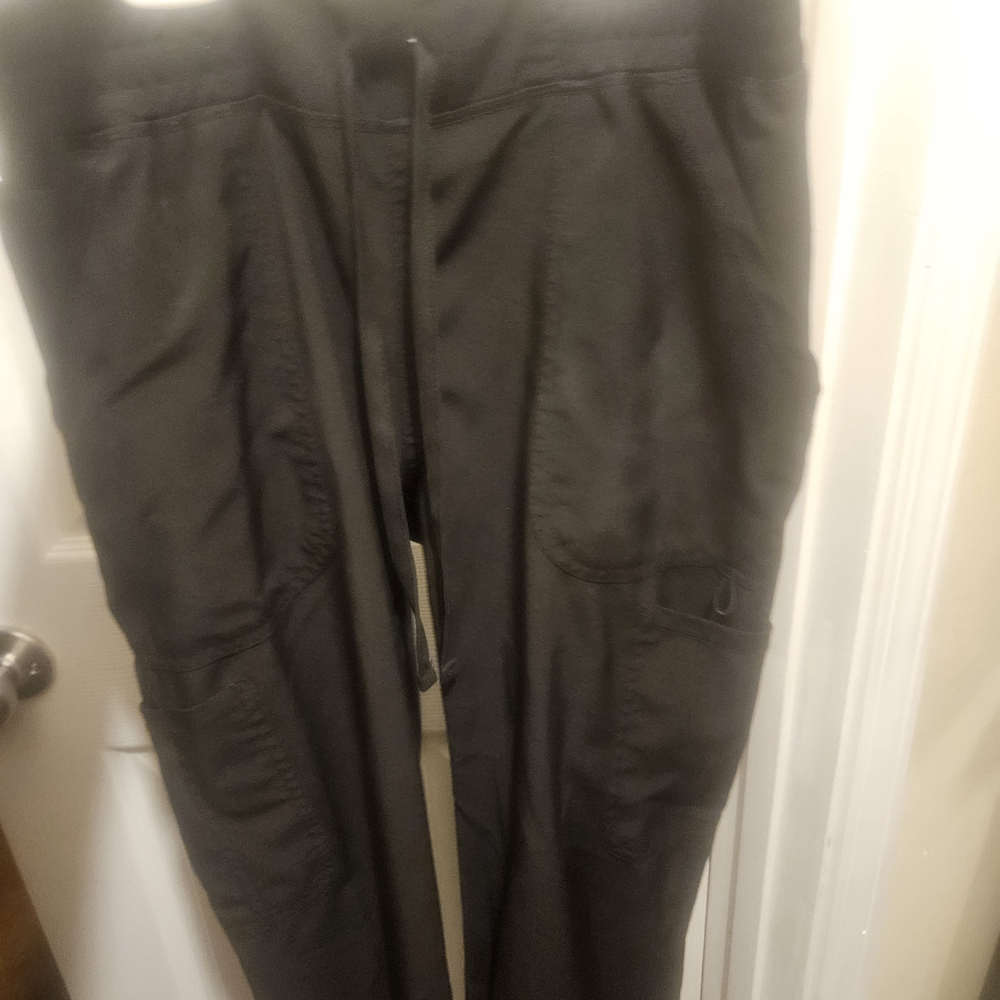 4 Sets Of Black Scrubs